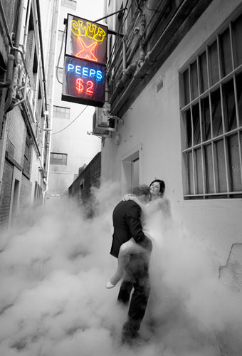 A sexy wedding photo of newlyweds, in a Melbourne laneway.